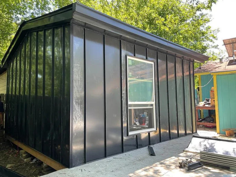 Black standing seam metal wall panels for Roof Inspection in Fox Crossing