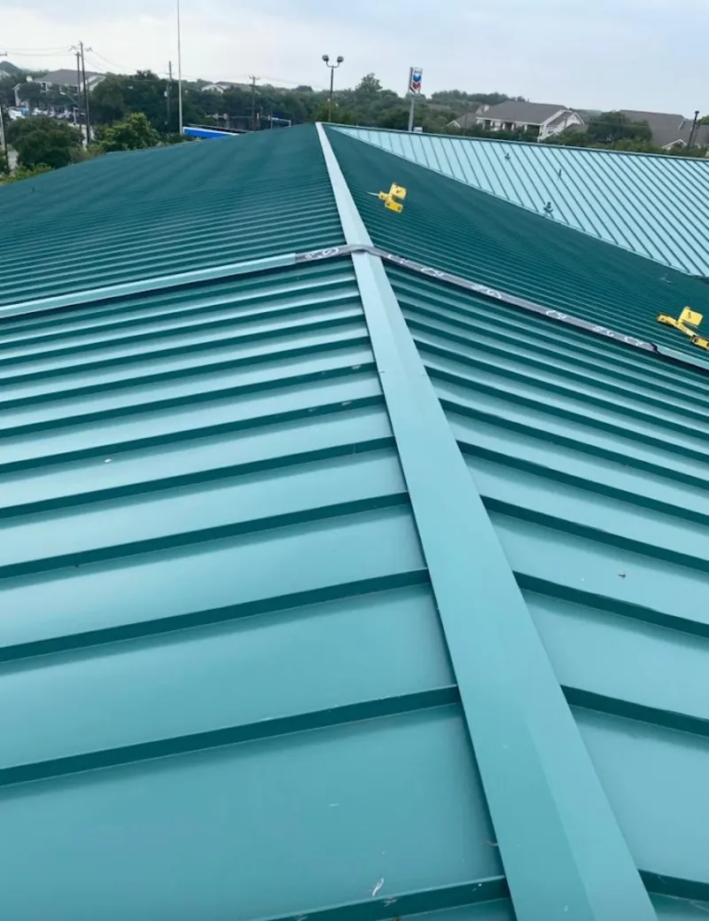 Green commercial metal roof ridge and valley for Metal Roof Repair in Fox Crossing