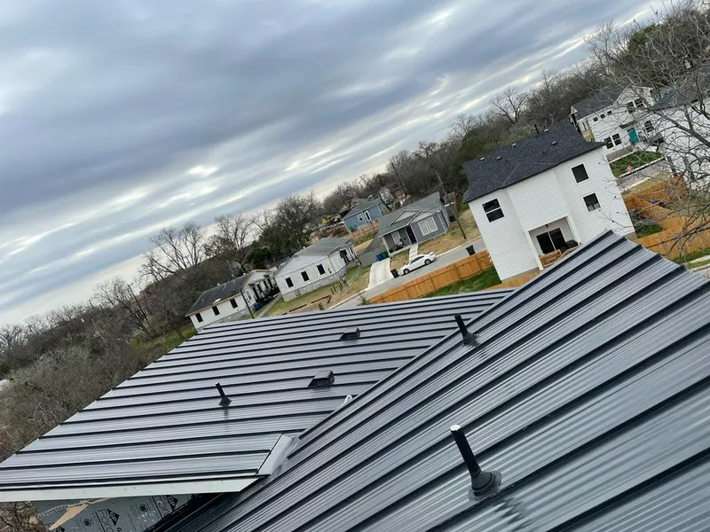Standing seam metal roof panels with vents for Skylight Repair in Fox Crossing